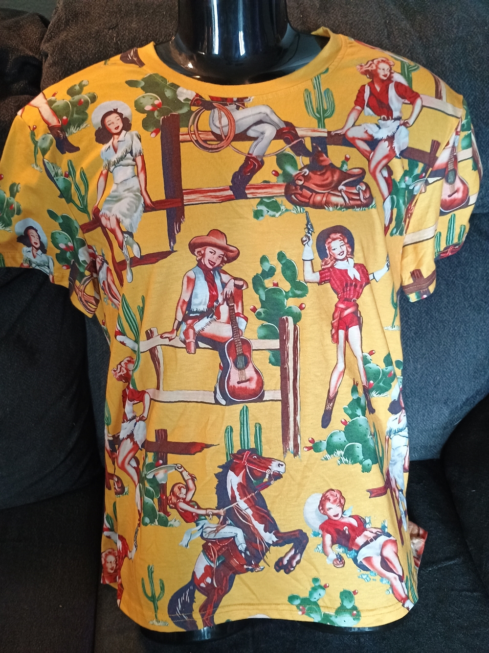 Fun and eye-catching Western cowgirl all-over print T-shirt featuring a colorful